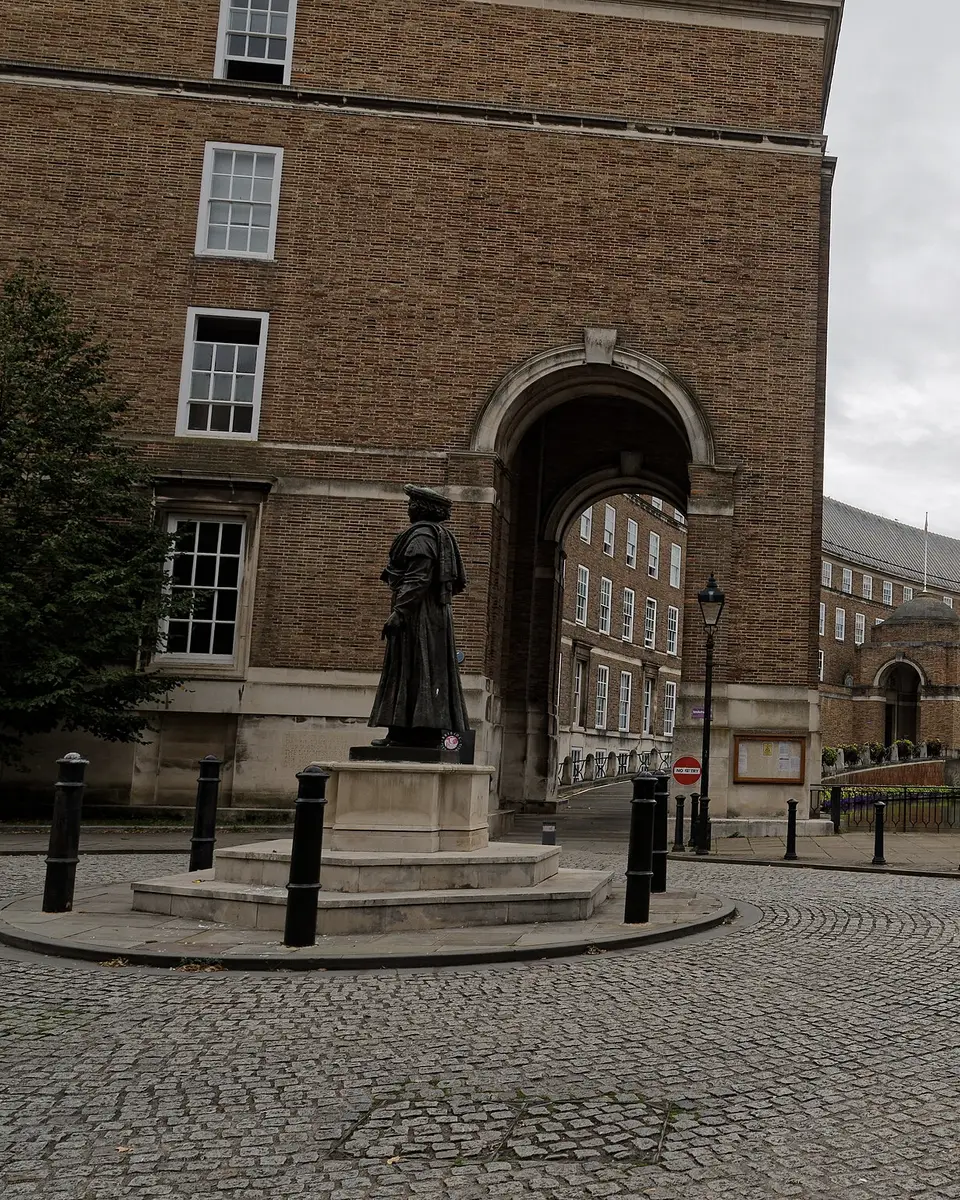 The entrance of Bristol City Hall on College Green, seen across its ornamental moat